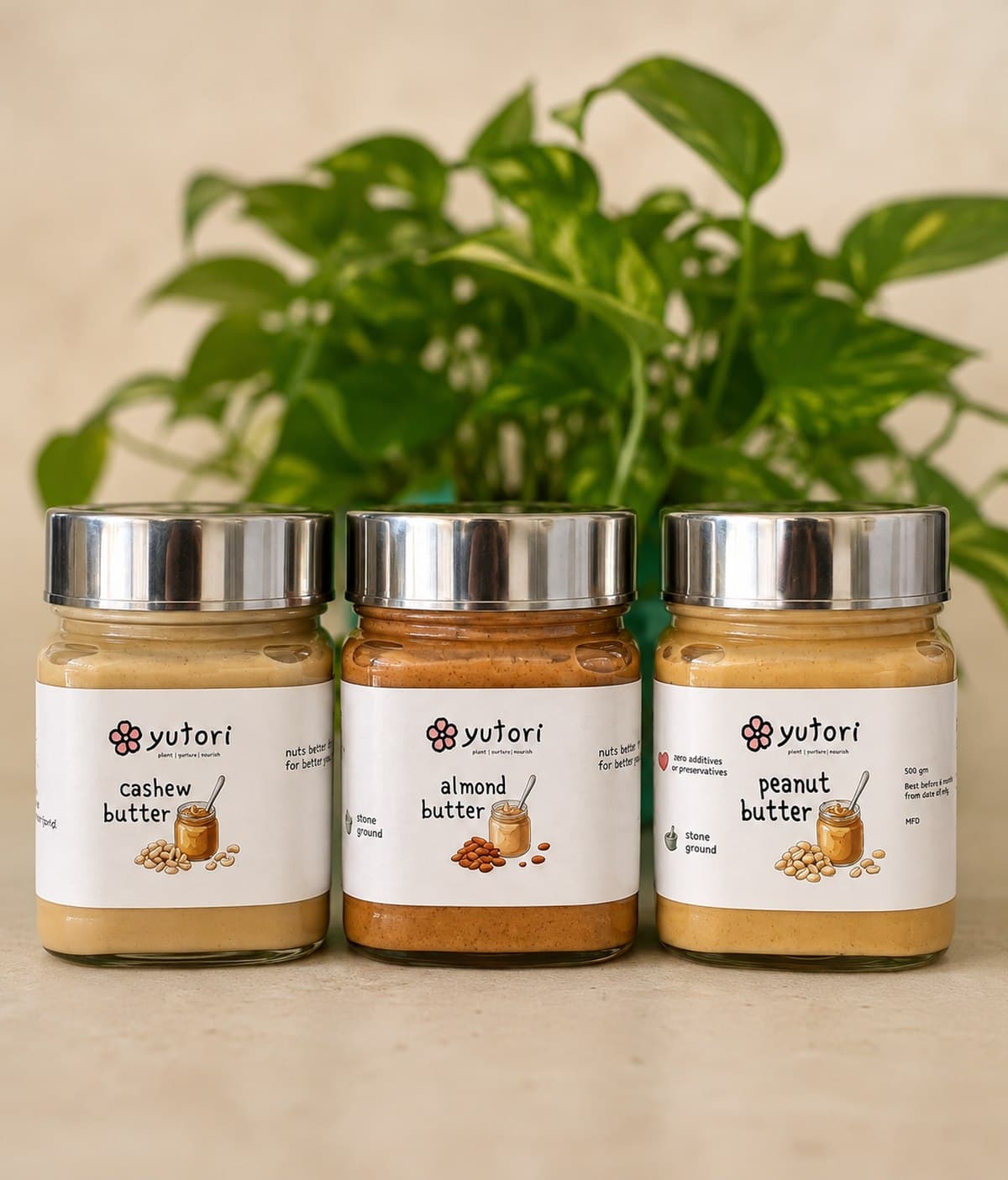 Jars of Yutori cashew, almond and peanut butter side by side